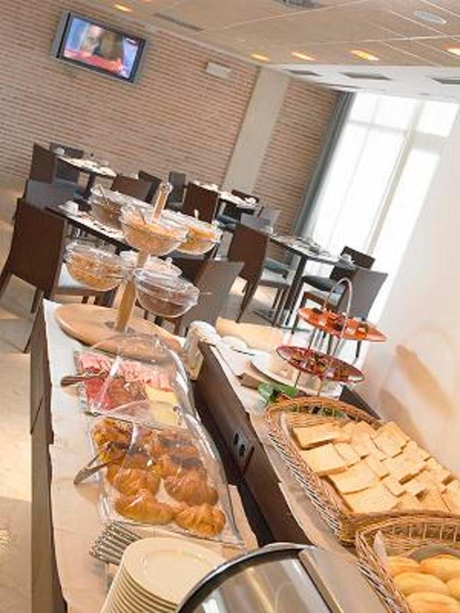 Hotel Isla De La Garena Alcalá de Henares Restaurant foto